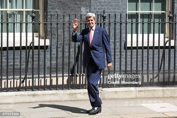 John Kerry, U.S. Secretary of State, gestures as he arrives for a meeting with U.K. Prime Minister Theresa May at 10 Downing Street in London, U.K.,...