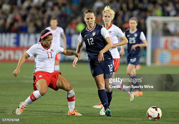 January 2014 - U.S. Women's National Team midfielder Lauren Holiday and Canada midfielder Desiree Scott during the international friendly soccer...