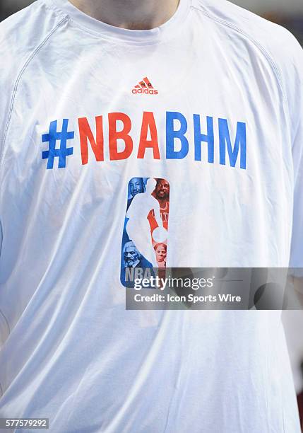 The NBA players wear practice tshirts with an update logo in honor of Black History Month during an NBA game between the Cleveland Cavaliers and the...