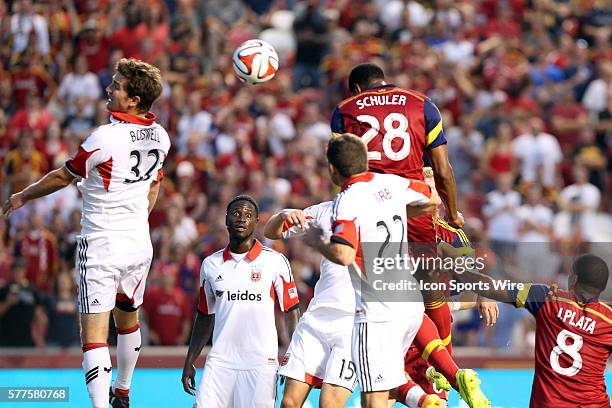 Salt Lake's Chris Schuler heads his second goal of the game past DC United's Bobby Boswell and Chris Korb . Real Salt Lake hosted DC United at Rio...