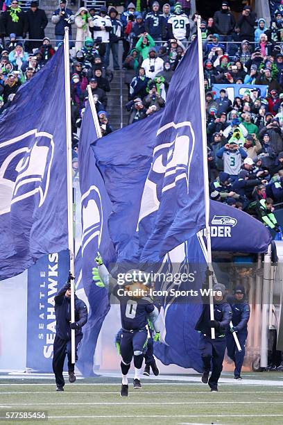 Seattle Seahawks mascot Blitz lead the players out on the field. Seattle Seahawks players and 12th man fans celebrated bringing the Lombardi trophy...