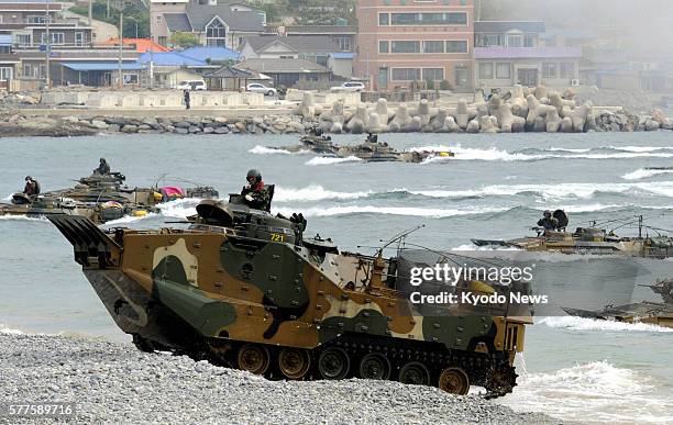 Pohang, South Korea - Members of South Korean forces conduct a landing exercise along a beach in Pohang, North Gyeongsang Province, on May 19, 2011.