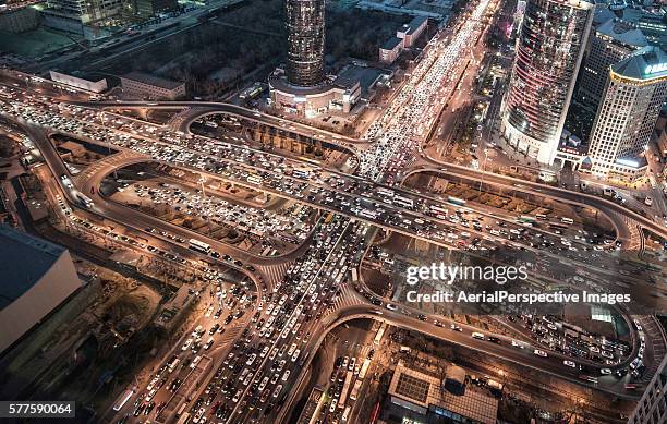 aerial view of traffic jam in beijing at night - traffic jam china stock pictures, royalty-free photos & images