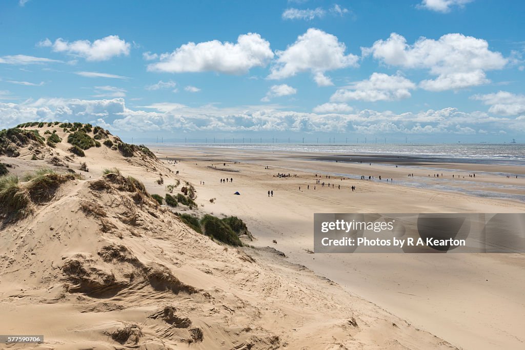 People on the beach at Formby point, Merseyside, England