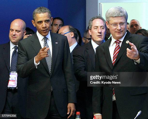 France - U.S. President Barack Obama and Canadian Prime Minister Stephen Harper are seen at the venue of a two-day Group of Eight summit in...