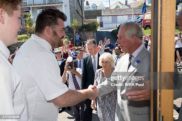 Prince Charles, Prince of Wales and Camilla, Duchess of Cornwall meet chef Nathan Outlaw and cast members of the TV show 'Doc Martin' at Nathan...