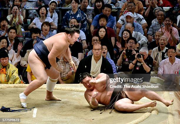 Ikioi throws Mongolian yokozuna Hakuho to win during day nine of the Grand Sumo Nagoya Tournament at the Aichi Prefecture Gymnasium on July 18, 2016...