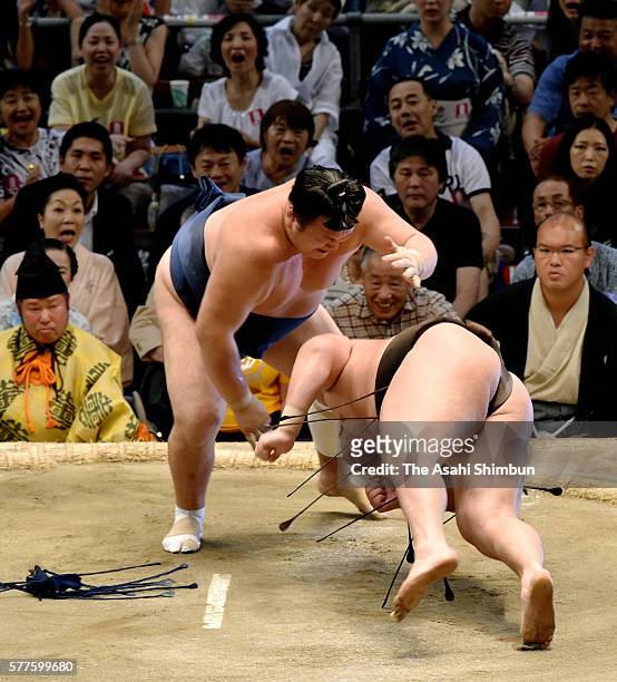 Ikioi throws Mongolian yokozuna Hakuho to win during day nine of the Grand Sumo Nagoya Tournament at the Aichi Prefecture Gymnasium on July 18, 2016...
