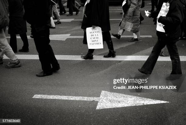 French teachers and other public service employees demonstrate in a street of the Lyon, southeastern France, to protest against jobs' cuts and low...