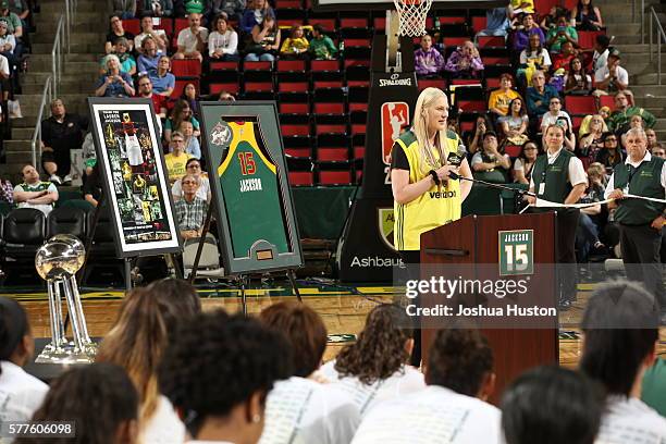 Retired WNBA player Lauren Jackson is honored during a ceremony retiring her No. 15 jersey which became the first jersey retired by the Storm at Key...