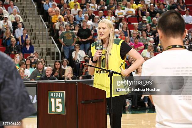 Retired WNBA player Lauren Jackson is honored during a ceremony retiring her No. 15 jersey which became the first jersey retired by the Storm at Key...