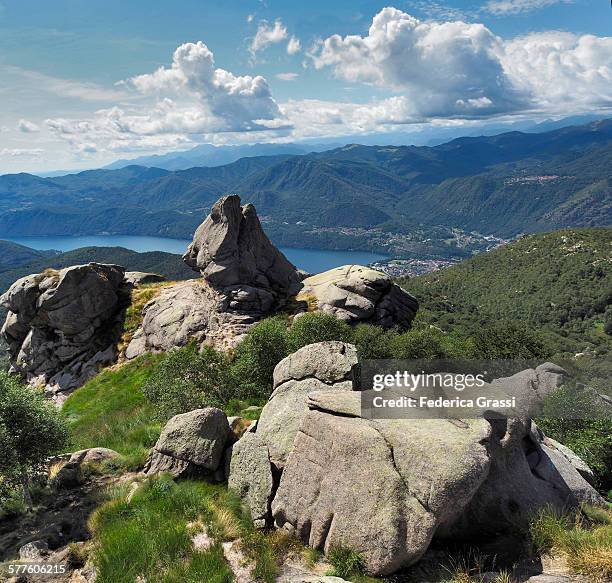 outdoor rock climbing at mount mottarone - lake orta stock pictures, royalty-free photos & images