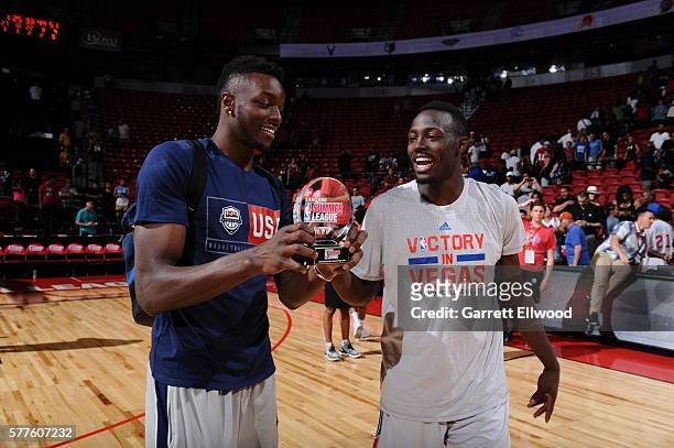 Jerian Grant of the Chicago Bulls celebrates with his brother Jerami Grant of the Philadelphia 76ers after being awarded the Championship Game MVP...