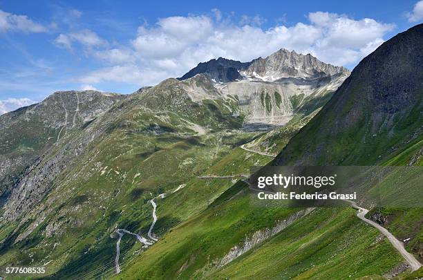 nufenen mountain pass in the swiss alps - kanton tessin stock pictures, royalty-free photos & images