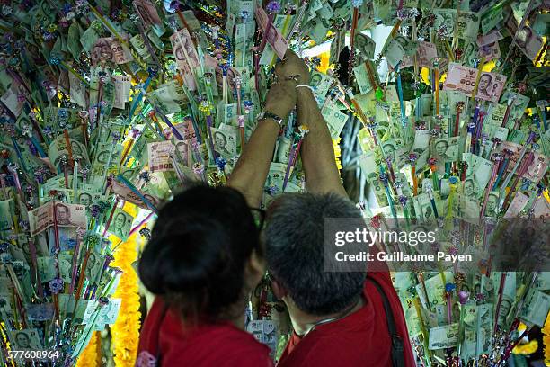 Buddhists devotees gather at Wat Pathum Temple to celebrate Asana Bucha Day know as Buddhist Day. The day is observed on the full moon of the eighth...