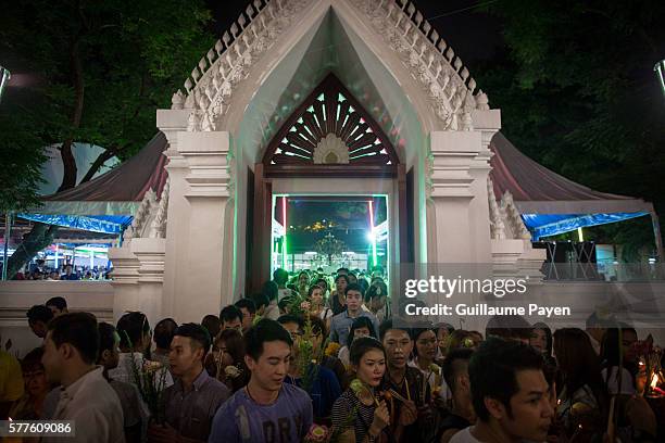 Buddhists devotees gather at Wat Pathum Temple to celebrate Asana Bucha Day know as Buddhist Day. The day is observed on the full moon of the eighth...