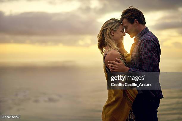 love that speaks to the soul - romantic couple cuddling stock pictures, royalty-free photos & images