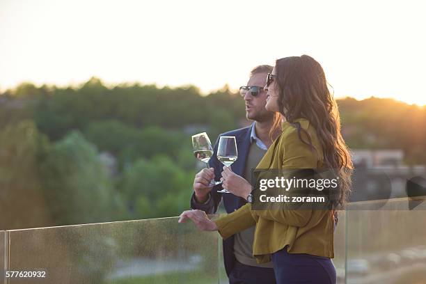 couple with wine - glass half full party stock pictures, royalty-free photos & images