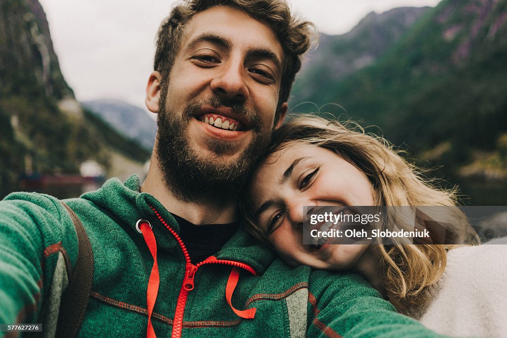 Selfie of couple in mountains