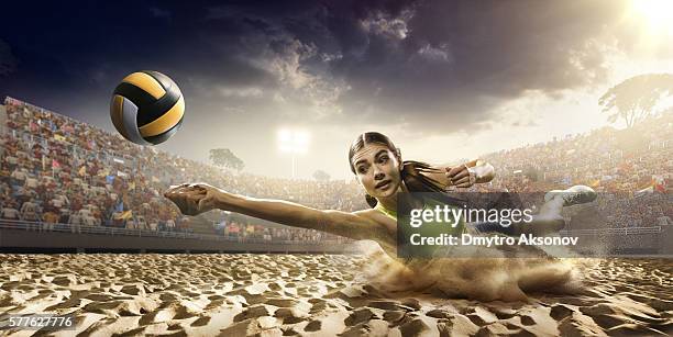 volleyball: female player in action - beach volley 個照片及圖片檔