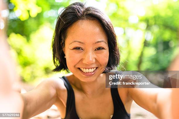 woman take a selfie on the wood during the jogging - pictures of containers seized by customs stock pictures, royalty-free photos & images