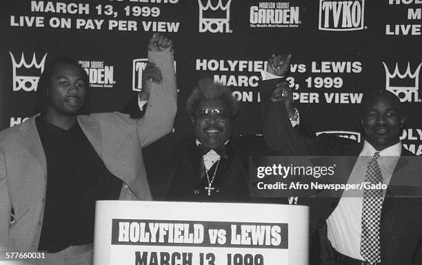 Heavyweight boxing champion Evander Holyfield and Don King during a press conference for the Evander Holyfield vs Lennox Lewis boxing match, 1999.