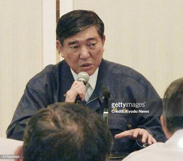 Japan - Shigeru Ishiba, chief policymaker of the main opposition Liberal Democratic Party, talks with leaders of municipalities within Fukushima...
