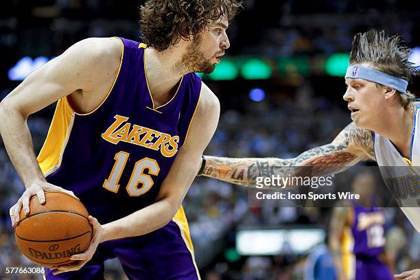 The Denver Nuggets' Chris Andersen tries to guard the Los Angeles Lakers' Pau Gasol during the first half of Game 4 of the NBA Western Conference...