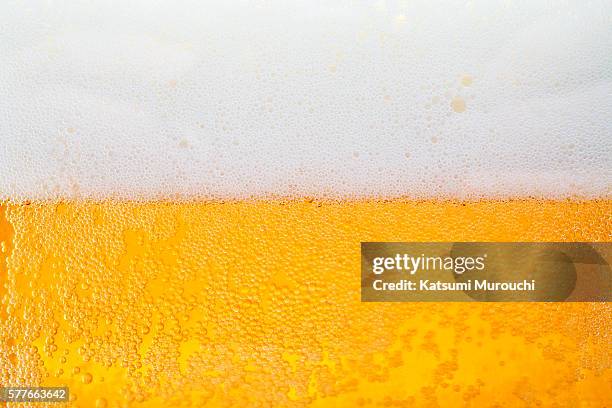 beer close-up background - beer close up foto e immagini stock