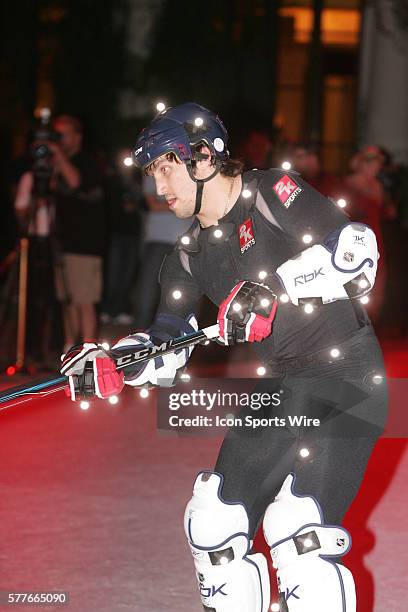 Ryan Kesler of the Vancouver Canucks skates around on a synthetic ice surface set up in front of Caesars Palace Hotel and Casino in Las Vegas, NV....