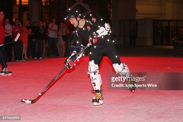 Ryan Kesler of the Vancouver Canucks skates around on a synthetic ice surface set up in front of Caesars Palace Hotel and Casino in Las Vegas, NV....