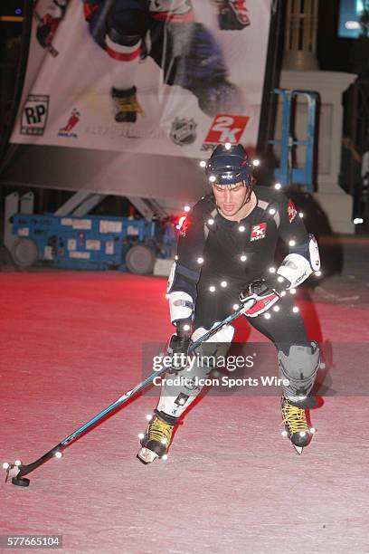 Ryan Kesler of the Vancouver Canucks skates around on a synthetic ice surface set up in front of Caesars Palace Hotel and Casino in Las Vegas, NV....