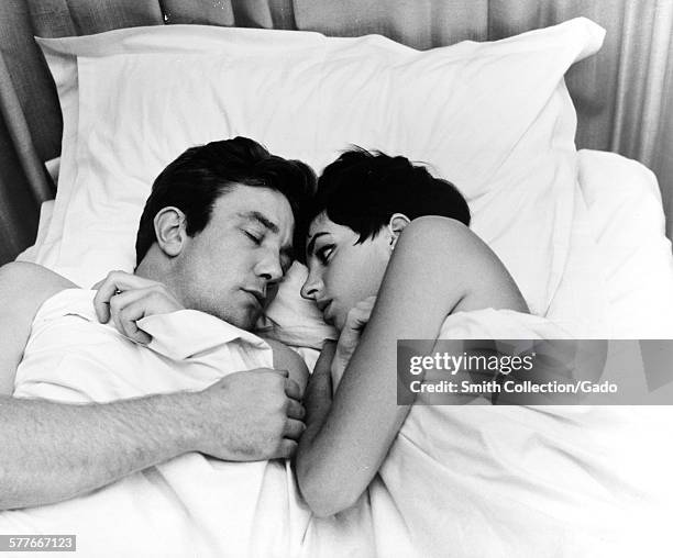 Liza Minnelli and Albert Finney lying in bed during the film Charlie Bubbles, 1967.