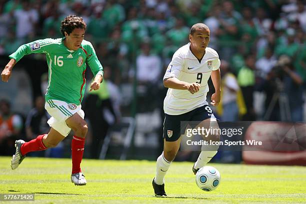 Charlie Davies breaks away from Efrain Juarez . The Mexico Men's National Team defeated the United States Men's National Team 2-1 at Estadio Azteca...