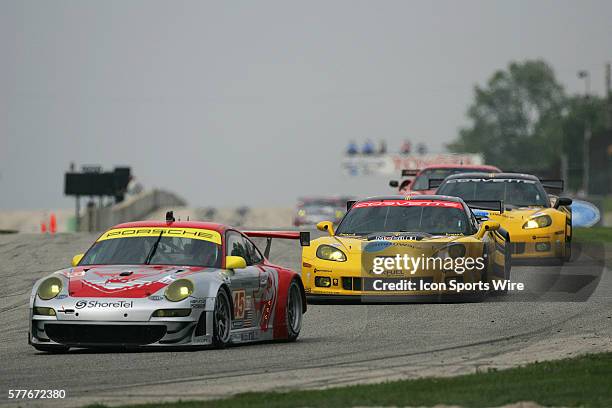 Joerg Bergmeister and Patrick Long in the Porsche 911 GT3 RSR were denied a podium finish by the BMW and Covette entries during for the Time Warner...