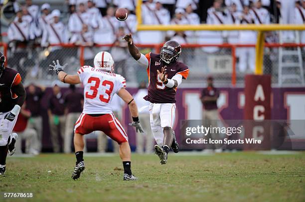 Virginia Tech quarterback Tyrod Taylor and Nebraska safety Matt O'Hanlon during the Hokies 16-15 win over the Nebraska Huskers at Worsham Field at...