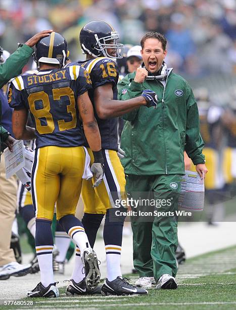 New York Jets offensive coordinator Brian Schottenheimer reacts after a touchdown in the first quarter during the New York Jets 24-17 win over the...