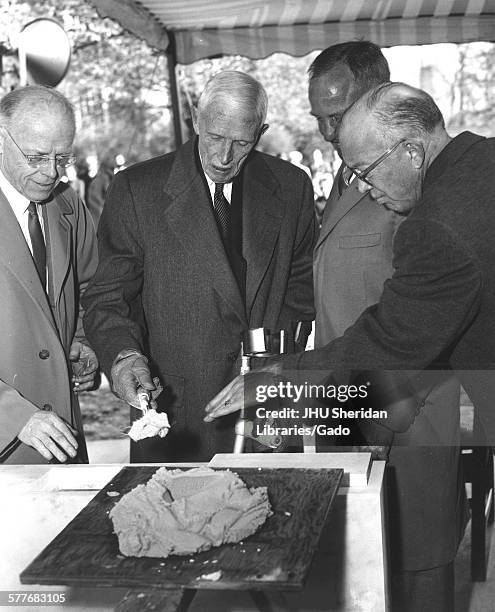 Barton Hall, Carlyle Barton, Allan Conradt Davis, Milton Stover Eisenhower, Stuart Symington Janney, Sealing of copper box in cornerstone, with...