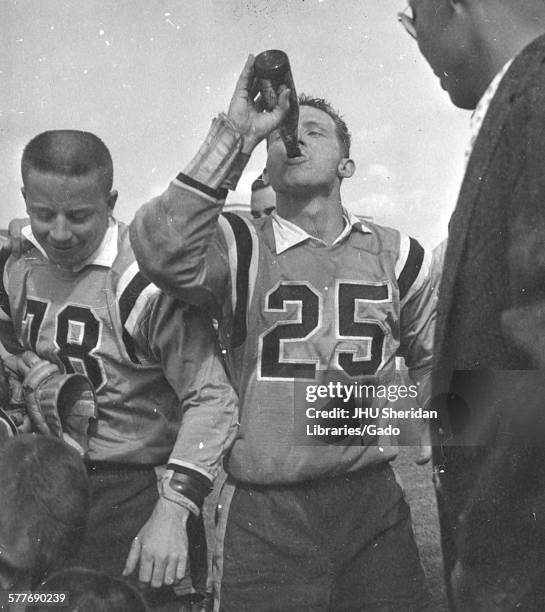 Lacrosse, Alfred Lester Seivold, Seivold drinking beer after University of Maryland game, 1959.