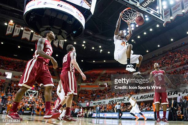 Oklahoma State Cowboys forward/center Kamari Murphy dunks during the NCAA basketball Big 12 Confrence game 'Bedlam' between the Oklahoma Sooners and...