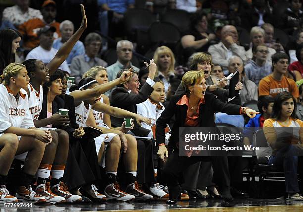 University of Texas Longhorns head basketball coach Gail Goestenkors shouts and points at the referee from in front of the University of Texas bench...