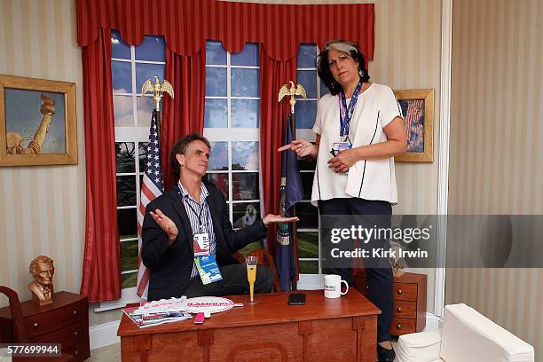 Jay Roach and Tammy Haddad pose in the mini oval office at Facebook Central at Freedom Plaza on July 19, 2016 in Cleveland, Ohio.