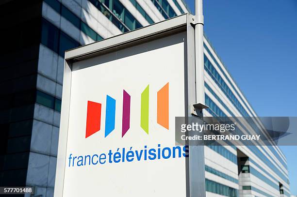 Picture taken on July 19, 2016 in Paris, shows the facade of French public national television broadcaster "France Television" and its logo. / AFP /...
