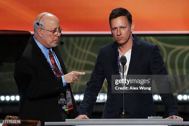 Peter Thiel, co-founder of PayPal, stands on stage prior to the start of the second day of the Republican National Convention on July 19, 2016 at the...