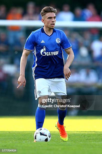 Joshua Bitter of Schalke runs with the ball during the friendly match between DSC Wanne-Eickel and FC Schalke 04 at Mondpalast Arena on July 19, 2016...