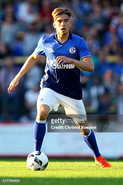 Joshua Bitter of Schalke runs with the ball during the friendly match between DSC Wanne-Eickel and FC Schalke 04 at Mondpalast Arena on July 19, 2016...