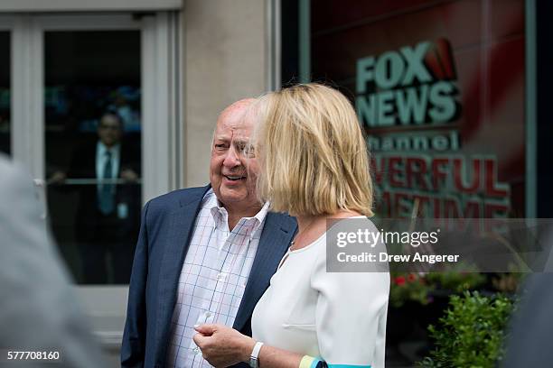 Fox News chairman Roger Ailes walks with his wife Elizabeth Tilson as they leave the News Corp building on July 19, 2016 in New York City. As of late...