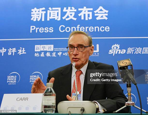 Australia's former Foreign Minister Bob Carr attends a press conference to discuss security cooperation of South China Sea during the fifth World...