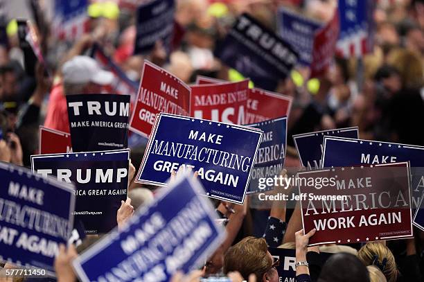 Delegates celebrate after the Speaker of the House Paul Ryan announces the official nomination of Republican presidential candidate Donald Trump on...