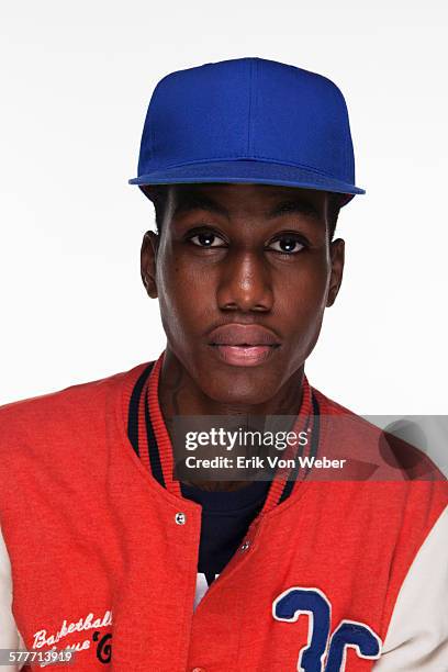 studio portrait of man on white background - pet stockfoto's en -beelden